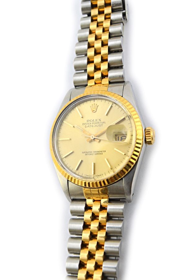 A gentleman's steel and gold Rolex Oyster Perpetual Datejust bracelet wristwatch, the signed circular gilt dial with baton shaped numerals, date of th