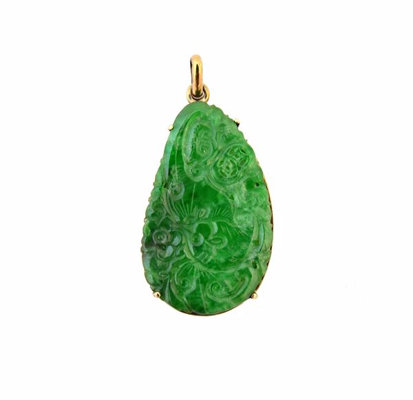 A gold mounted, drop shaped jade pendant, carved and pierced with an exotic bird motif, probably Chinese, length including suspension loop 3.8cm, widt