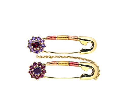 A 9ct gold, amethyst, garnet and vary coloured gemstone set and enamelled twin brooch, designed as two safety pins, each with a gemstone set cluster t