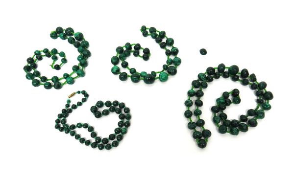 Four various single row necklaces of malachite beads.