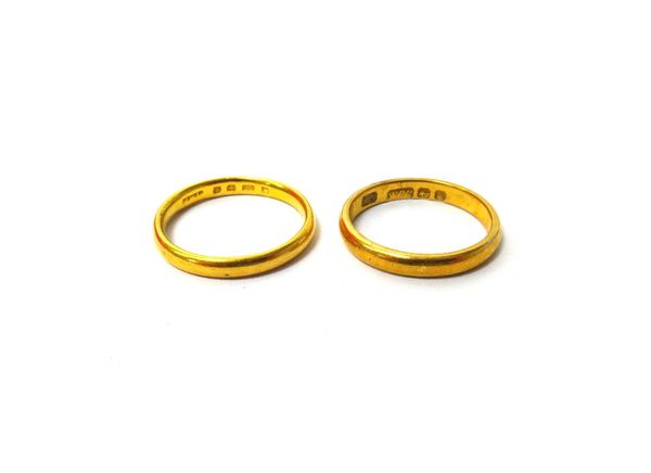 A Victorian 22ct gold plain wedding ring, Birmingham 1896, ring size L and a half and another 22ct gold plain wedding ring, London 1929, ring size N,