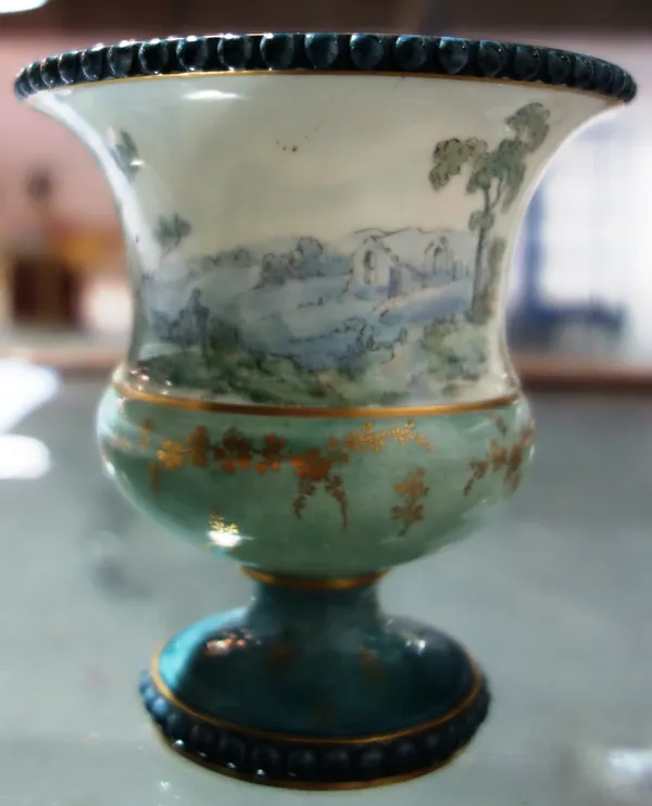 A Royal Crown Derby porcelain vase decorated with figures in landscapes.