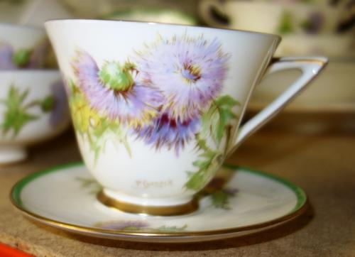 A large Royal Doulton Glamis Thistle pattern part dinner and tea service. (qty)