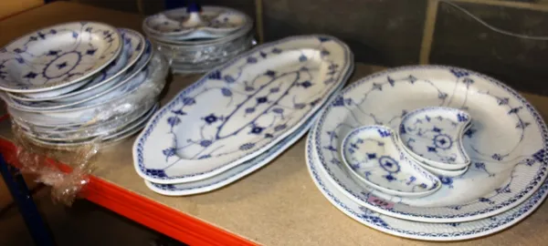 A Copenhagen blue and white decorated part dinner service. (qty)