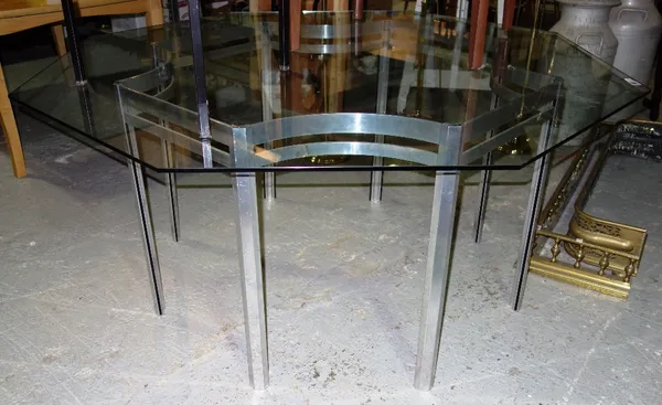 A 20th century dining table with octagonal glass top and chrome base, 153cm wide.