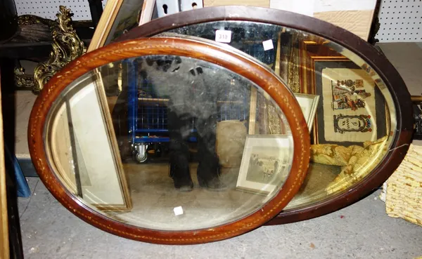 An oval mahogany wall mirror and another. (2)