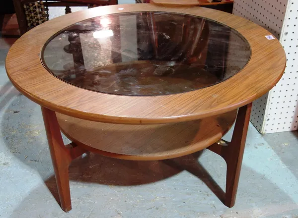 A 20th century G plan style circular two tier coffee table.