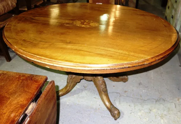 A Victorian inlaid walnut oval loo table.