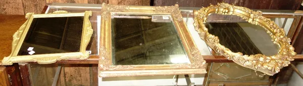 A group of three gilt turned wall mirrors. (3)
