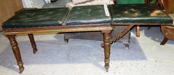 A 19th century mahogany and green leather adjustable day bed.