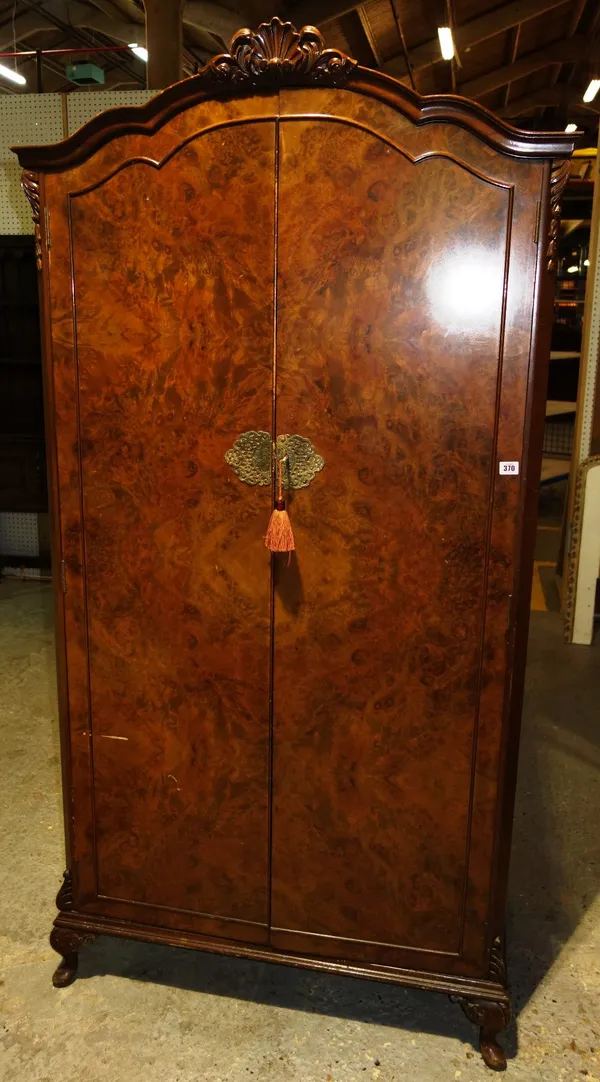 A 20th century mahogany wardrobe.