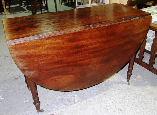 A 19th mahogany drop flap table.