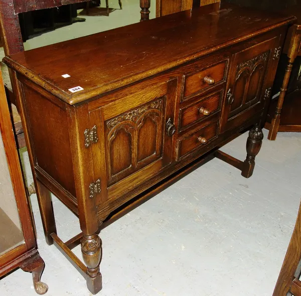 A 20th century oak sideboard and another similar.