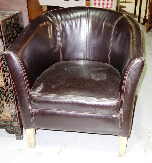 A pair of 20th century brown leather tub chairs. (2)