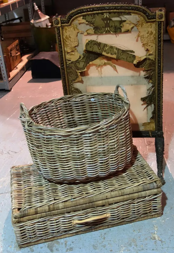 A 19th century parcel gilt fire screen frame and two wicker baskets. (3)