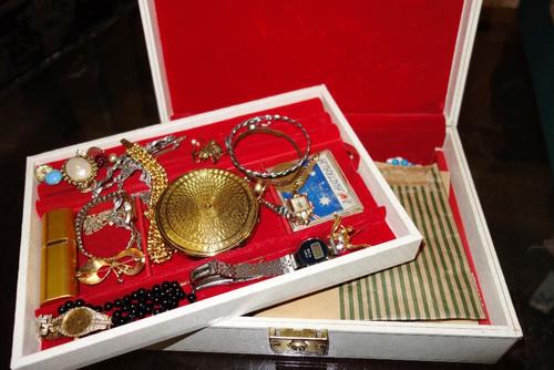 A box of costume jewellery.
