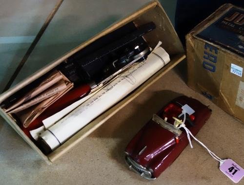 A 20th century Japanese faux tortoiseshell dressing table set, cased, together with a Schuco Radio 4012 tin plate car, and a Junero metal construction