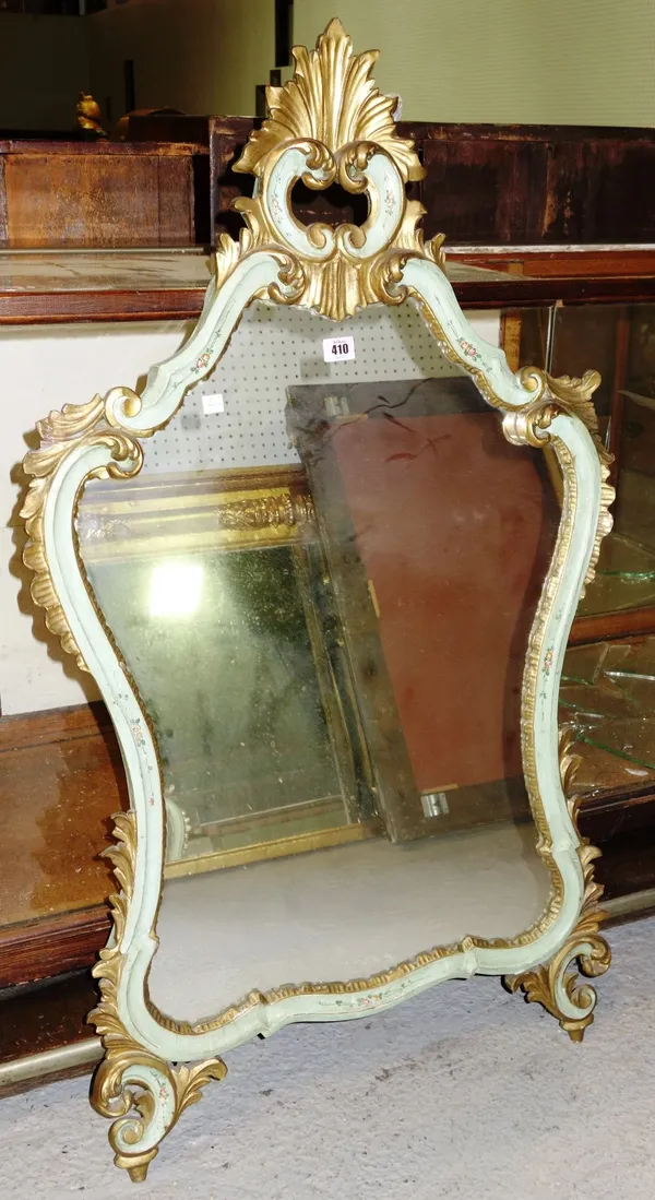 A green painted parcel gilt wall mirror with acanthus decoration.