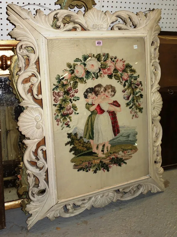 A 20th century grey painted acanthus molded frame with tapestry panel.
