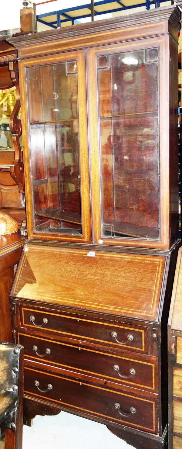 A mahogany and inlaid bureau bookcase.