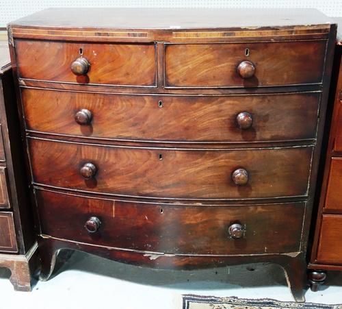 A 19th century mahogany bowfront chest of two short and three long drawers.