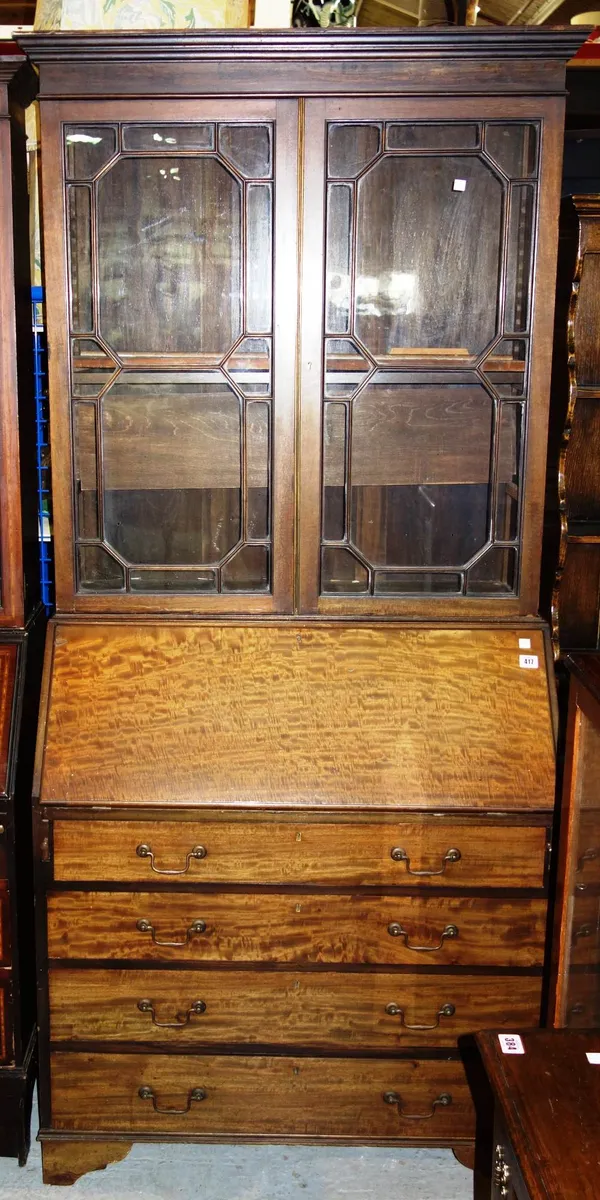 An Edwardian mahogany bureau bookcase.