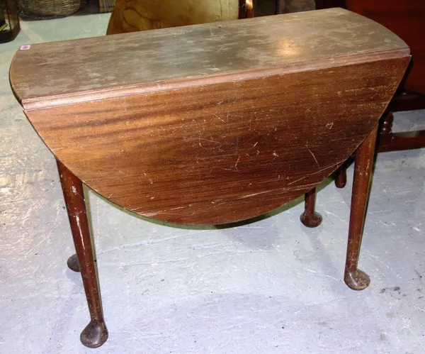 A reproduction mid 18th century style mahogany drop leaf table.