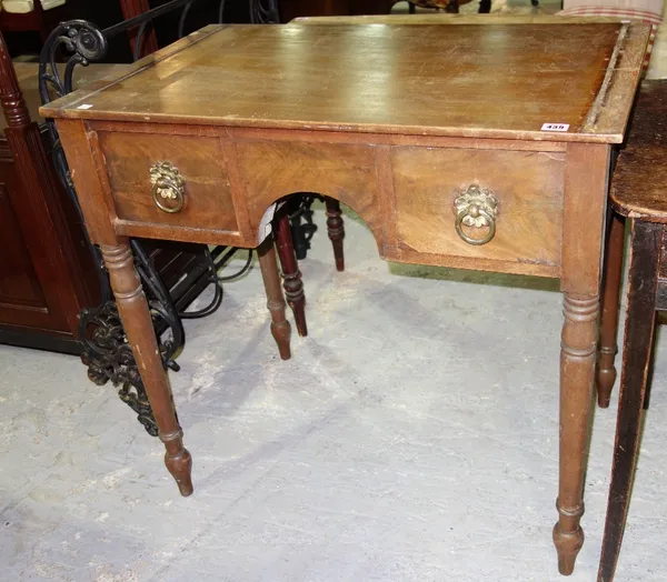 A late Regency mahogany dressing table.
