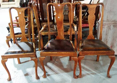 A set of six oak vase back dining chairs. (6)