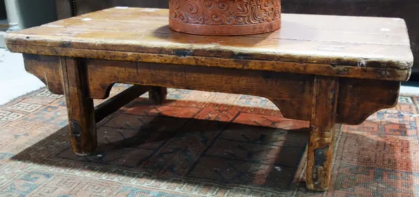 A 20th century Chinese softwood low table.