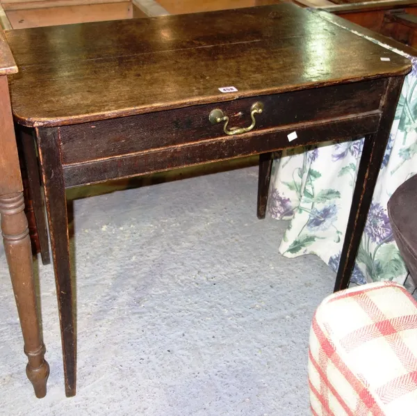 An oak rectangular single drawer side table.