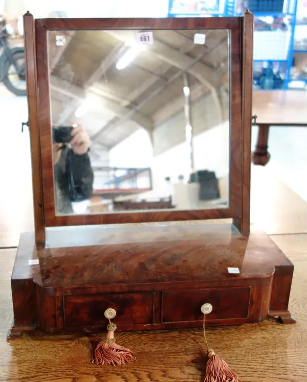 A mahogany two drawer swing frame mirror.