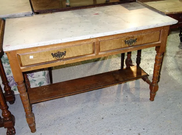A mahogany rectangular table with white marble top.