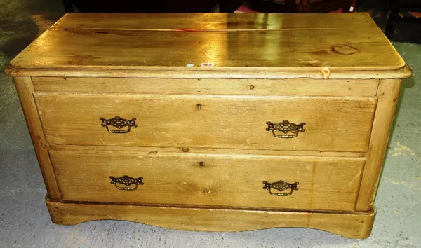 A 20th century pine two drawer chest.