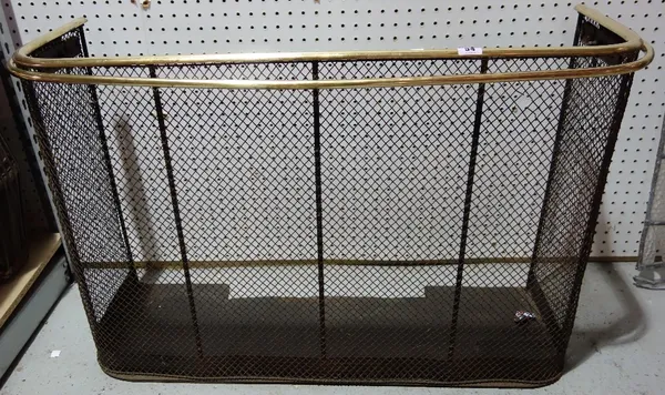 A brass framed nursery fender.