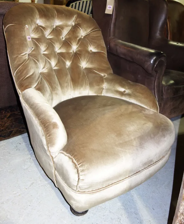 A 19th century velvet upholstered nursing chair.