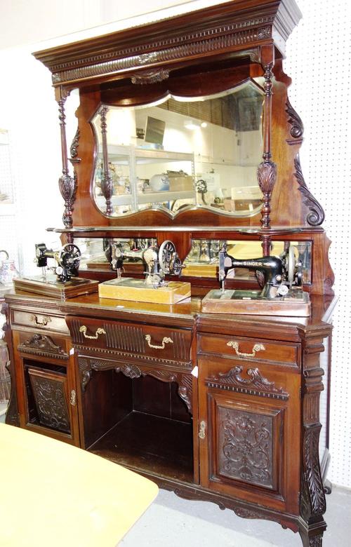 An Edwardian mahogany large mirror back sideboard.