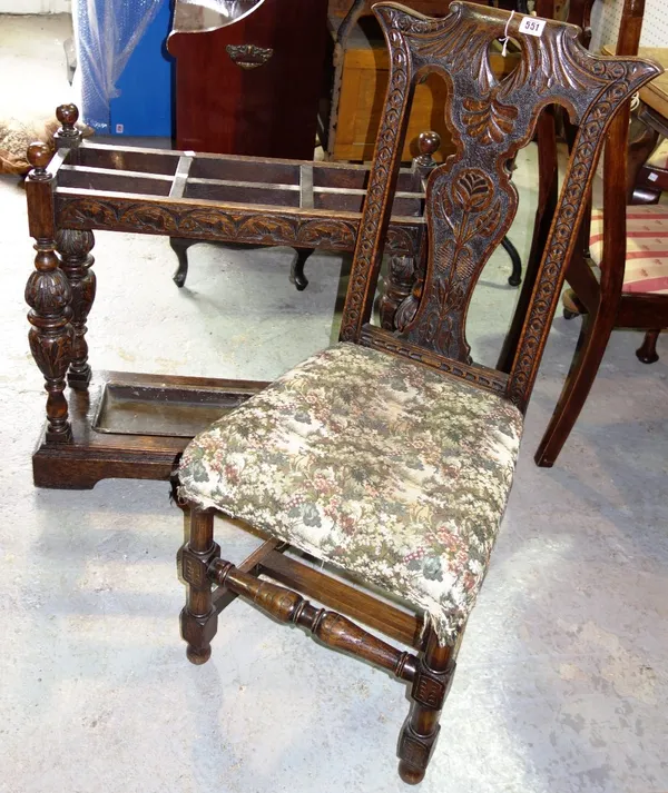 A Victorian carved oak stick stand, and a carved oak side chair. (2)