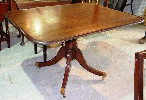 A 19th century mahogany rectangular tilt top table.