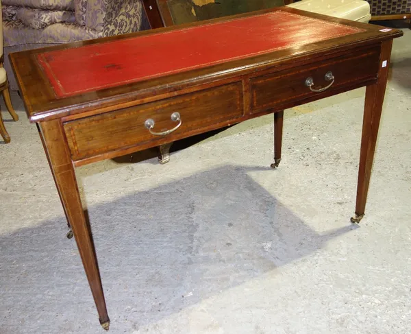 A 19th century mahogany writing table with red leather top and pair of drawers.
