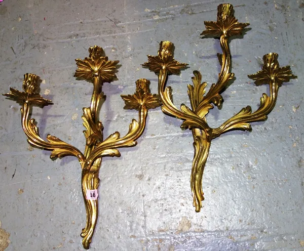 A pair of three branch acanthus moulded wall lights. (2)