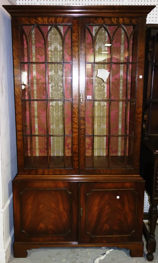 A 20th century mahogany glazed display cabinet.