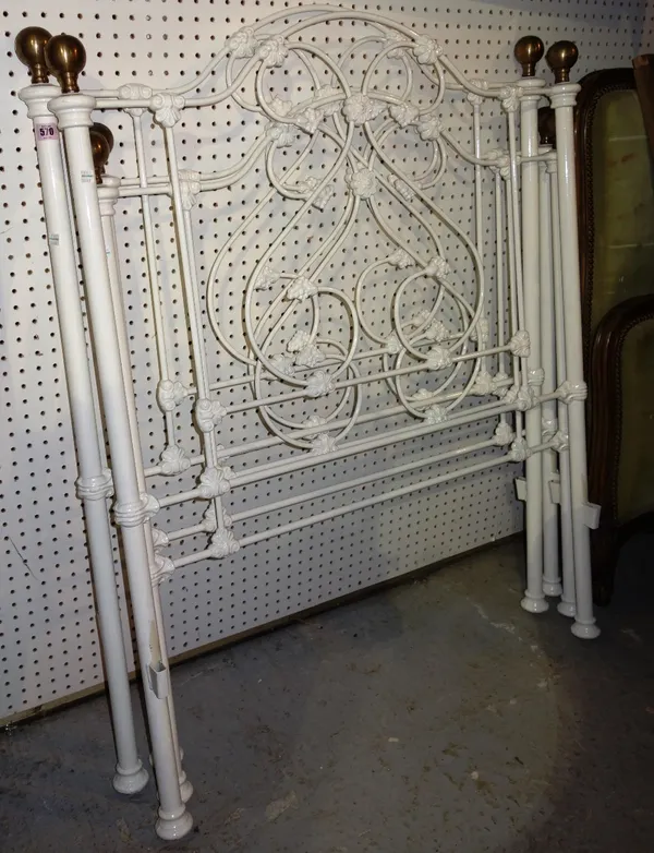 A pair of white wrought iron single beds. (2)