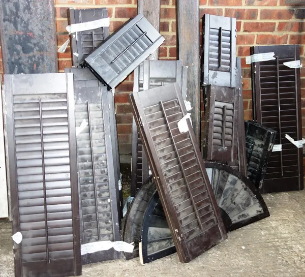 A large quantity of window shutters.
