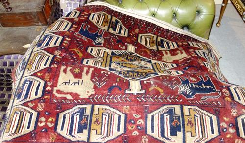 A pair of Beshir bags, Turkeman, the madder field with a bold medallion, four lions and birds, a complementary medallion border, dated 1911, 94cm x 14