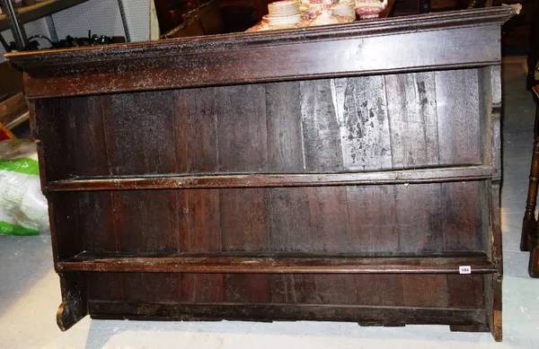An 18th century oak dresser rack.