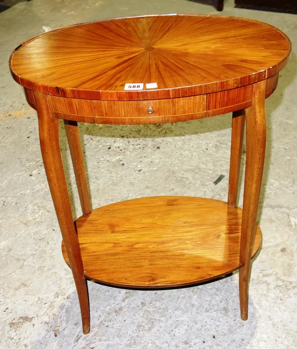 A 19th century oval kingwood two tier occasional table.