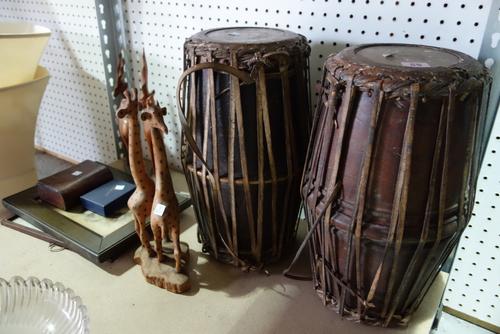 A pair of early 20th century banjos together with carved hardwood animals, together with two prints and sundry. (qty)