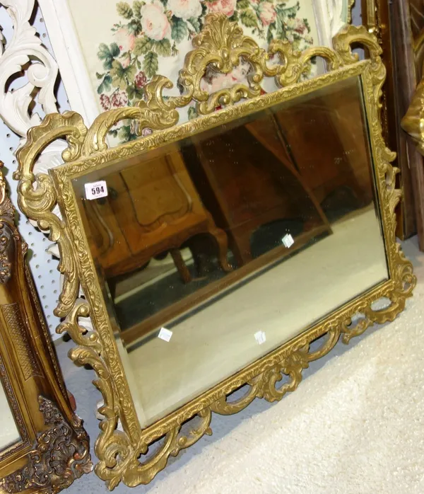 A 18th century style gilt mirror.