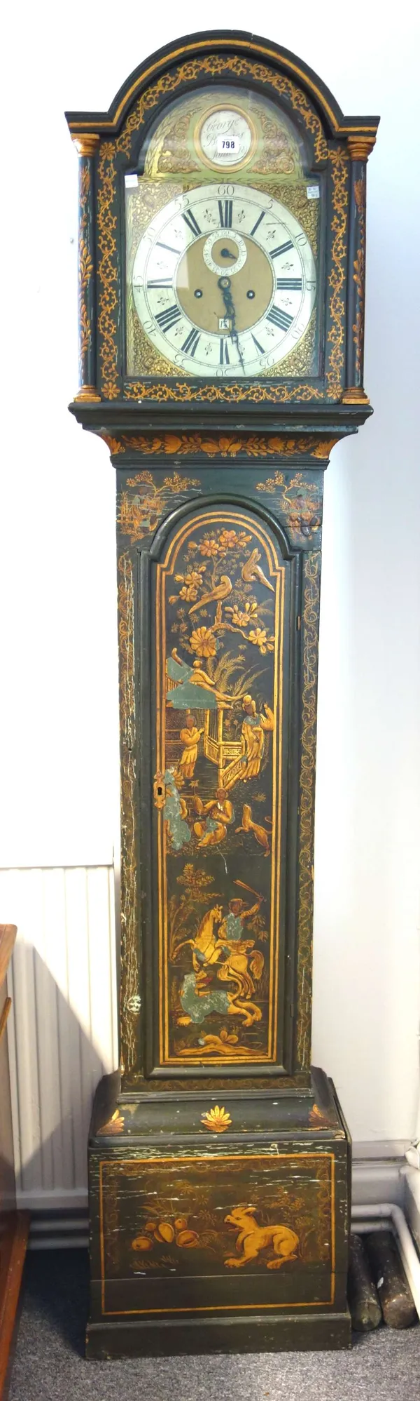 An 18th century green lacquer, gilt chinoiserie decorated eight day longcase clock, the arch top twelve inch dial with subsidiary day of month and sec